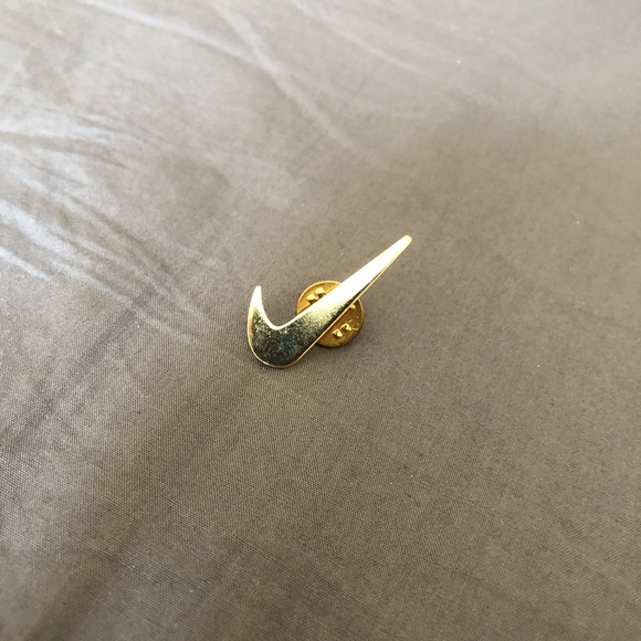 silver nike swoosh pin